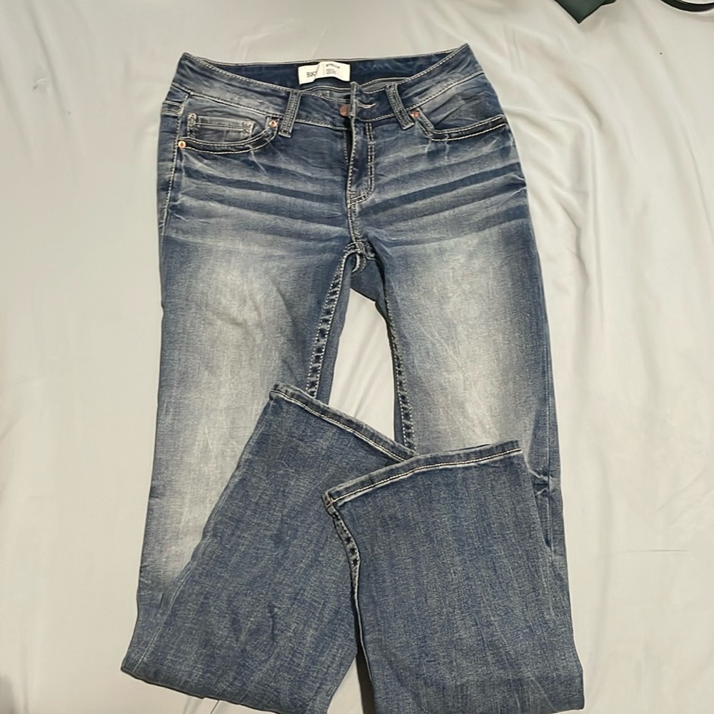 Women’s Buckle Jeans
